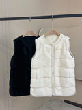 Cashmere vests and mink fur